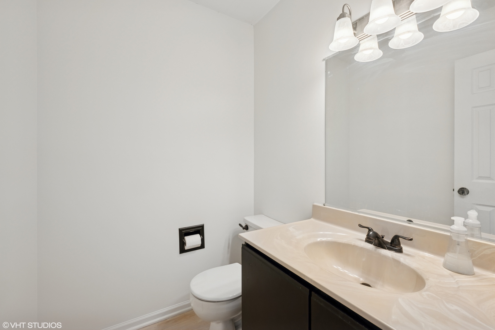 963 Old Oak Circle Algonquin, IL 60102 - Photo 11 of 28 a bathroom with a sink vanity mirror and toilet