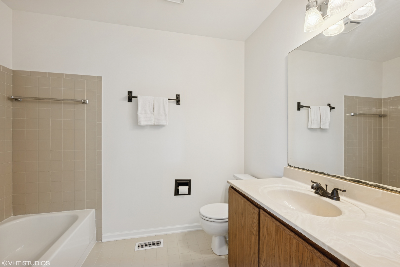 963 Old Oak Circle Algonquin, IL 60102 - Photo 18 of 28 a bathroom with a granite countertop sink toilet and shower