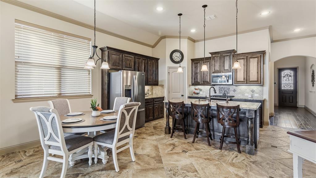 509 Alice Lane Fate, TX 75189 - Photo 7 of 36 In kitchen breakfast dining