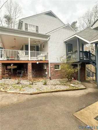 a view of a house with a iron gate
