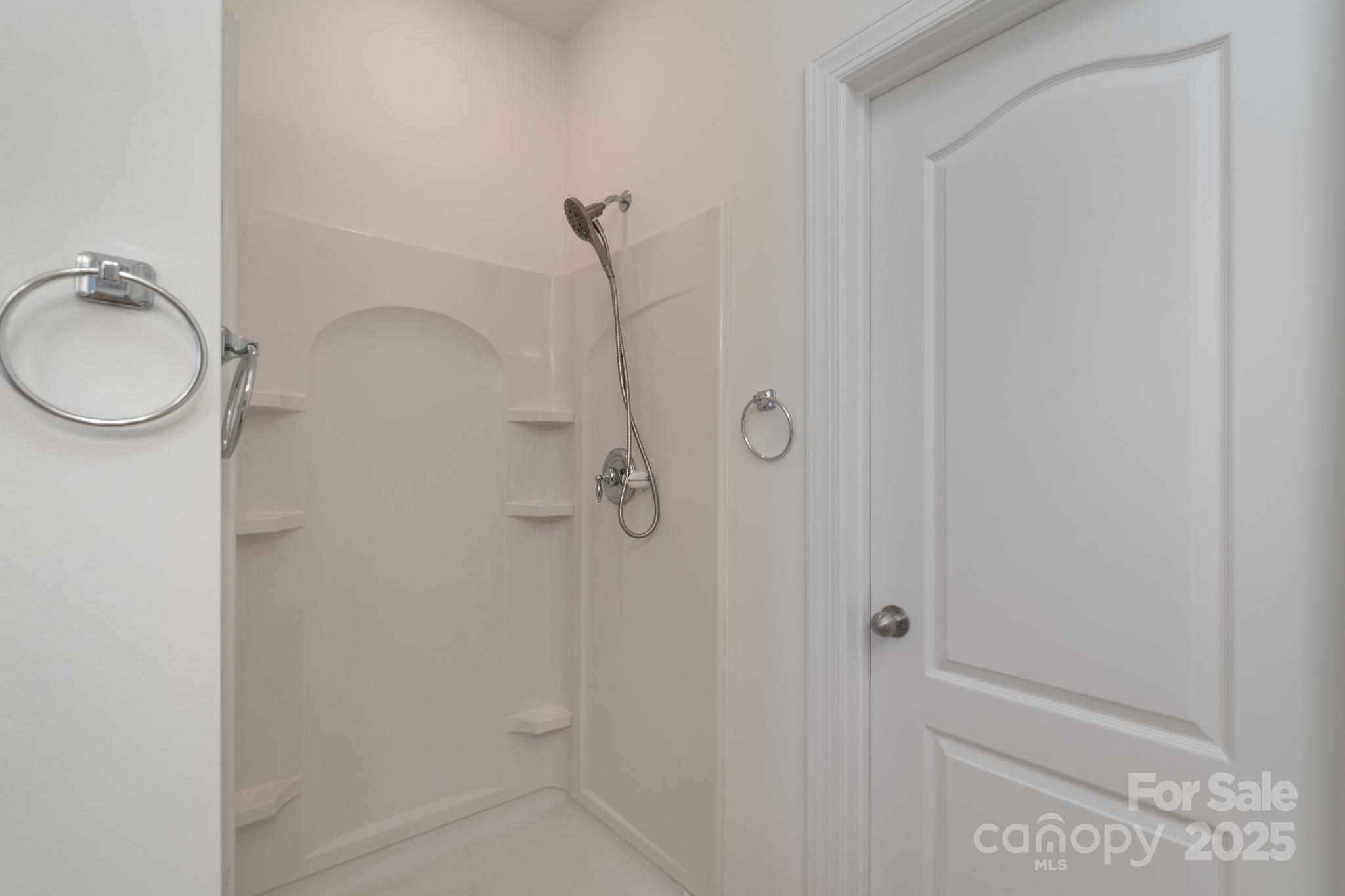 11945 Red Rust Lane Charlotte, NC 28277 - Photo 18 of 41 a bathroom with a shower