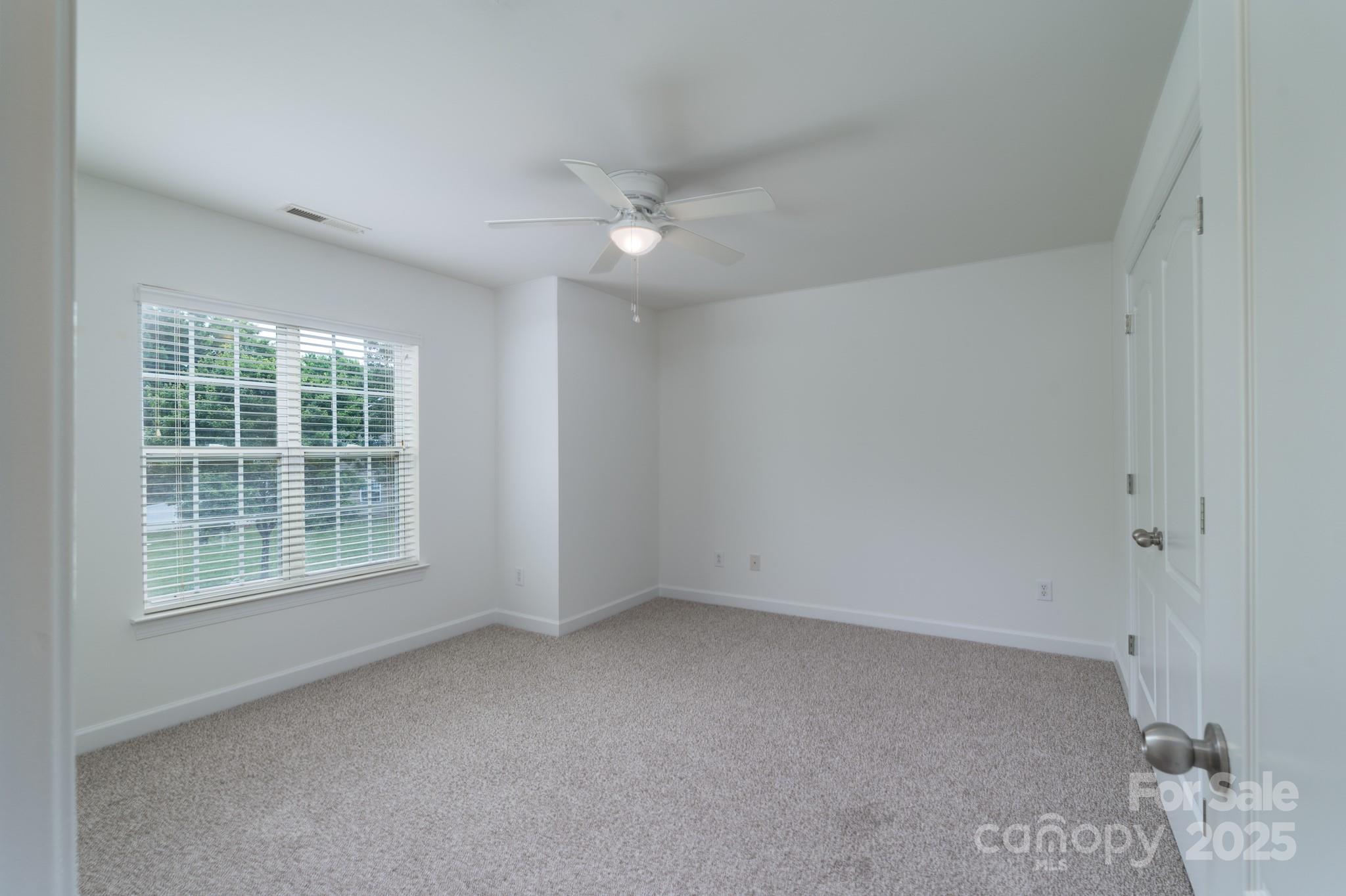 11945 Red Rust Lane Charlotte, NC 28277 - Photo 22 of 41 an empty room with a window