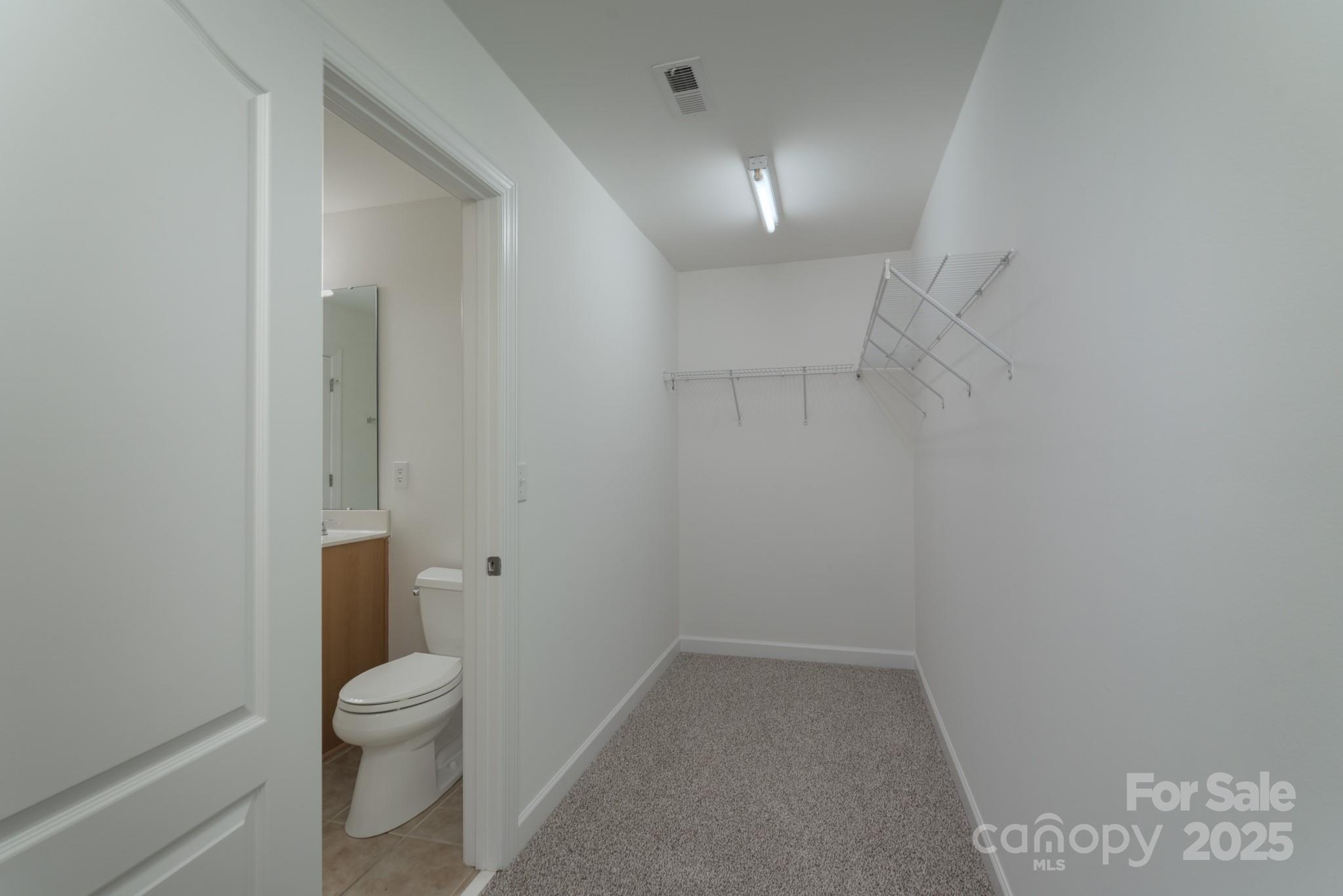 11945 Red Rust Lane Charlotte, NC 28277 - Photo 28 of 41 a bathroom with a toilet and a shower