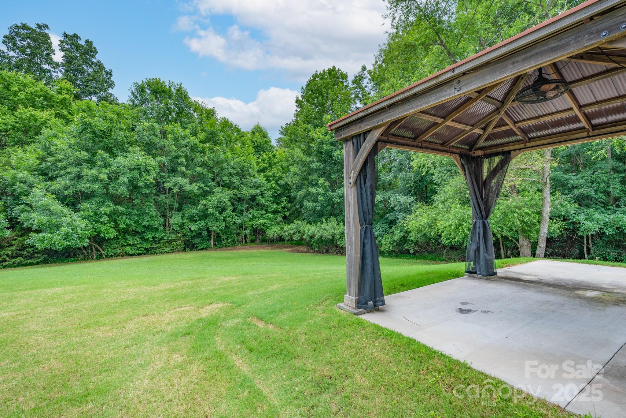 11945 Red Rust Lane Charlotte, NC 28277 - Photo 32 of 41 a view of a patio with a backyard