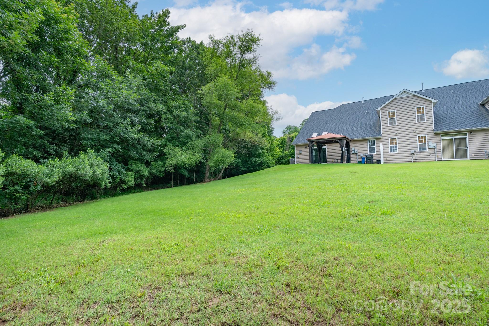 11945 Red Rust Lane Charlotte, NC 28277 - Photo 33 of 41 a view of a house with a yard