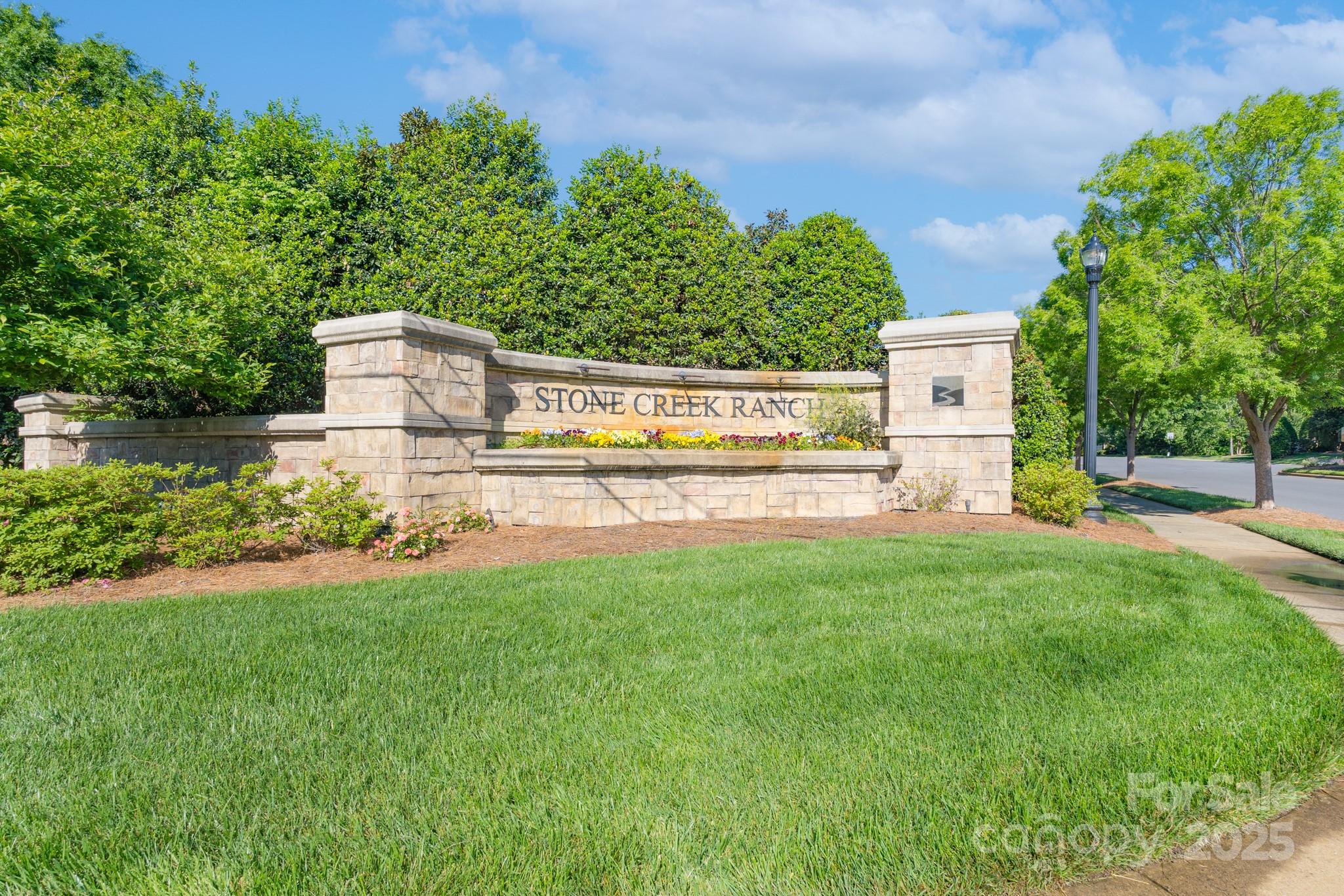11945 Red Rust Lane Charlotte, NC 28277 - Photo 36 of 41 a view of a garden with a house in the background
