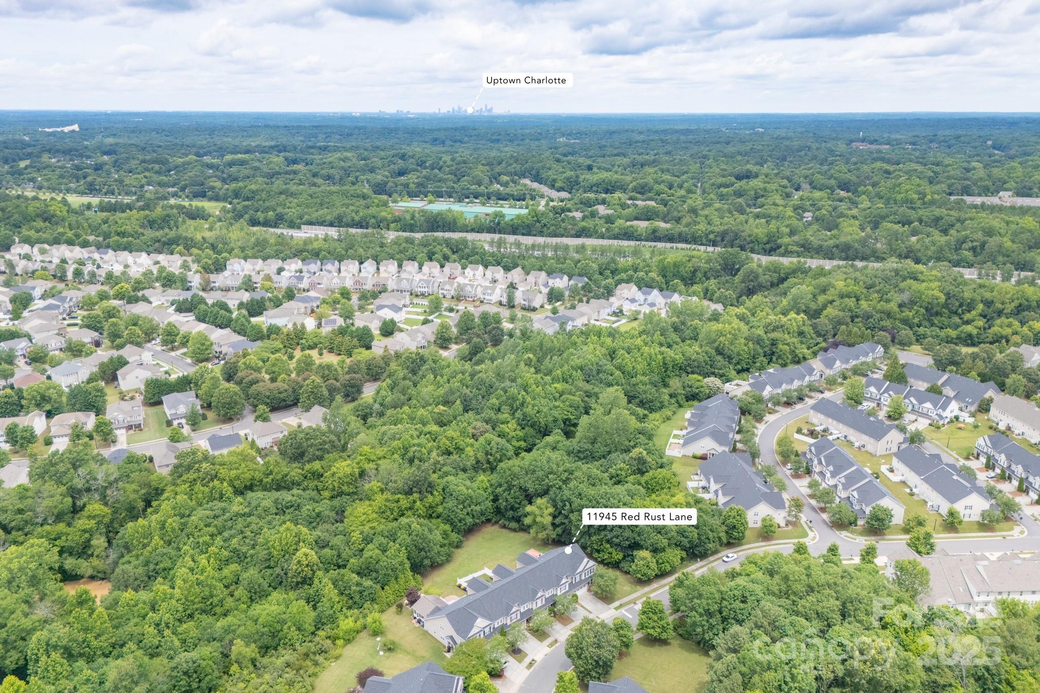 11945 Red Rust Lane Charlotte, NC 28277 - Photo 39 of 41 an aerial view of residential houses with outdoor space and trees