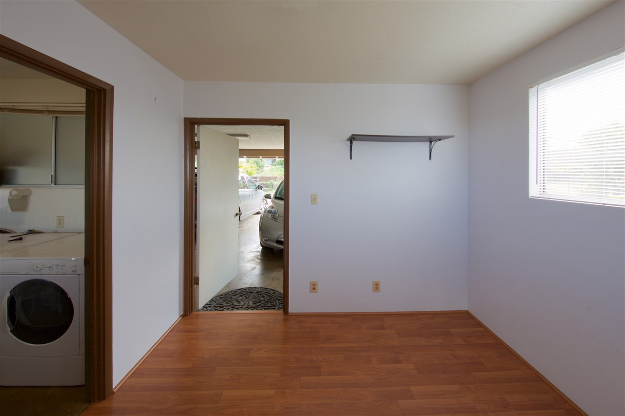 2150 Lower Kula Road Kula, HI 96790 - Photo 19 of 30 a view of a hallway with a washer and dryer