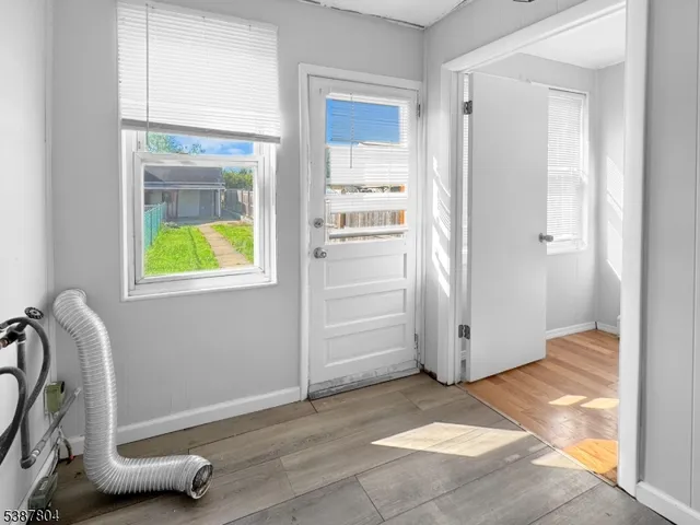 a view of an entryway with a livingroom