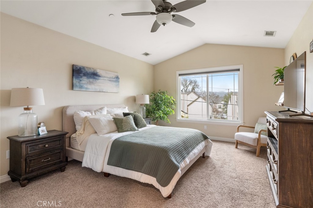 55 8th Street Templeton, CA 93465 - Photo 14 of 33 a bedroom with a large bed and a window