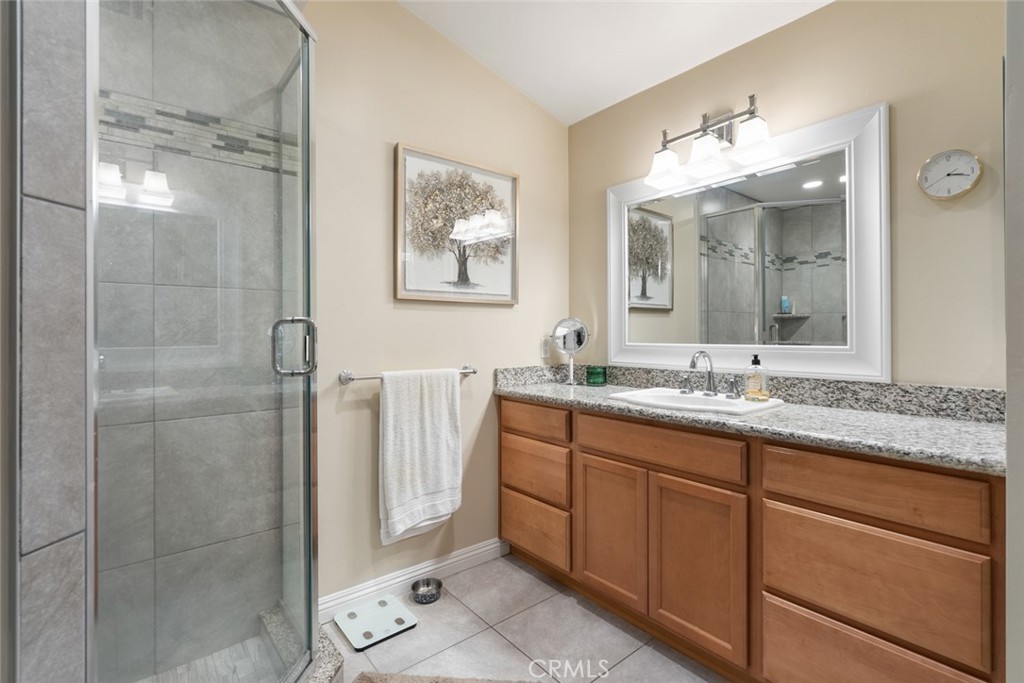 55 8th Street Templeton, CA 93465 - Photo 16 of 33 a bathroom with a double vanity sink mirror and shower