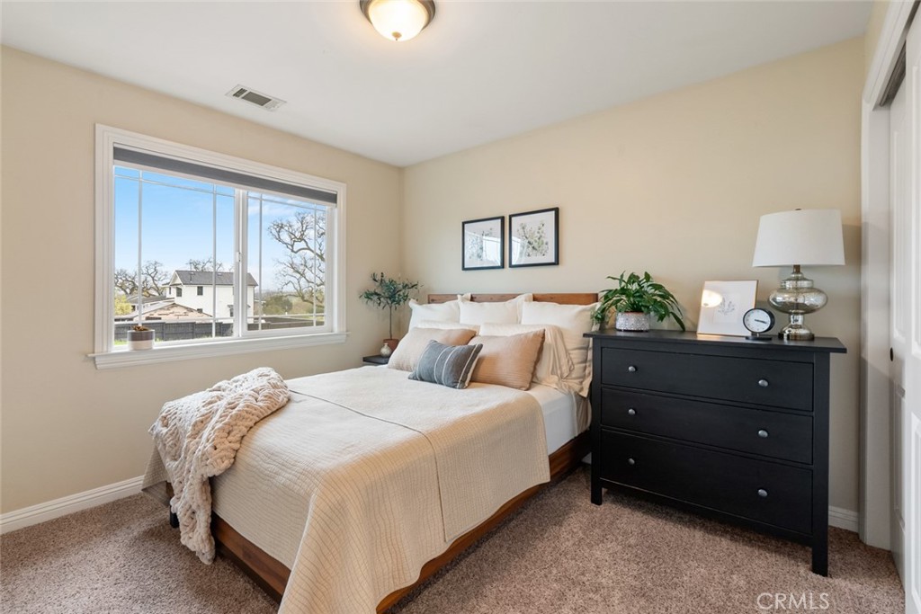 55 8th Street Templeton, CA 93465 - Photo 18 of 33 a bedroom with a bed and a window