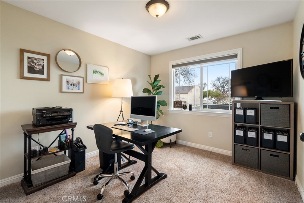 55 8th Street Templeton, CA 93465 - Photo 20 of 33 a view of a livingroom with furniture and a flat screen tv