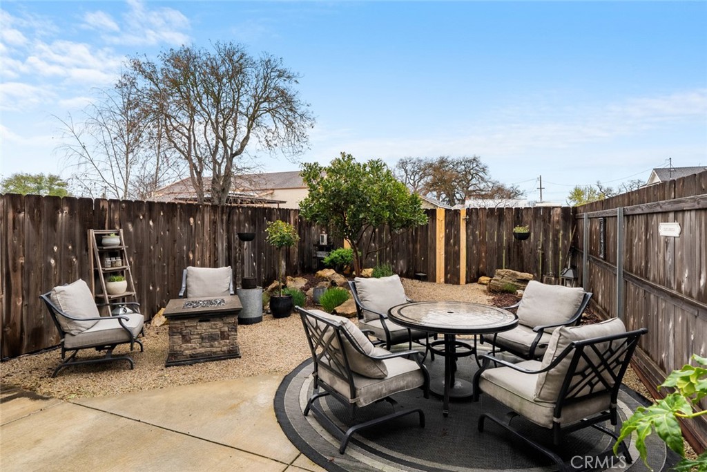 55 8th Street Templeton, CA 93465 - Photo 29 of 33 a view of a dinning table and chairs in the patio