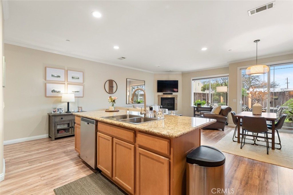 55 8th Street Templeton, CA 93465 - Photo 5 of 33 a living room with granite countertop furniture a sink a flat screen tv and kitchen view