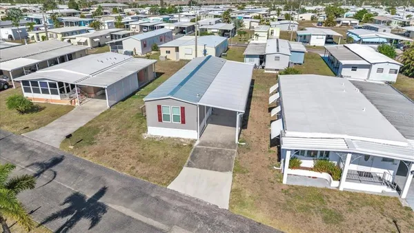 an aerial view of a house with a garden