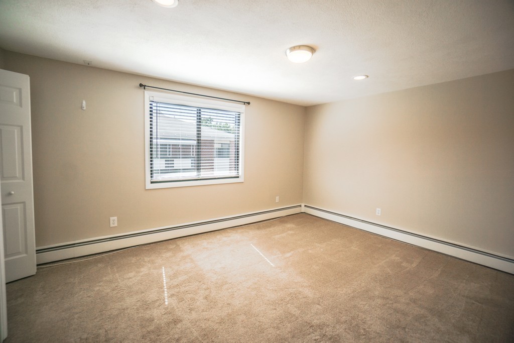 50 Colonial Drive, Unit 8 Andover, MA 01810 - Photo 12 of 25 an empty room with a window