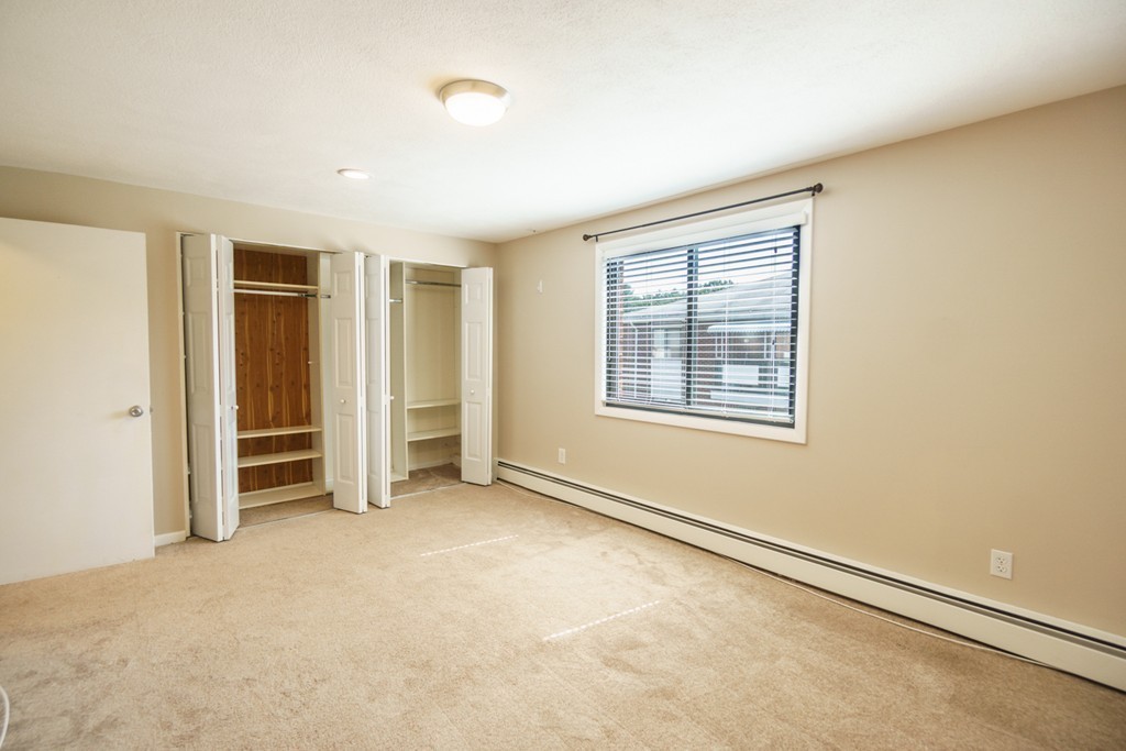 50 Colonial Drive, Unit 8 Andover, MA 01810 - Photo 13 of 25 an empty room with windows