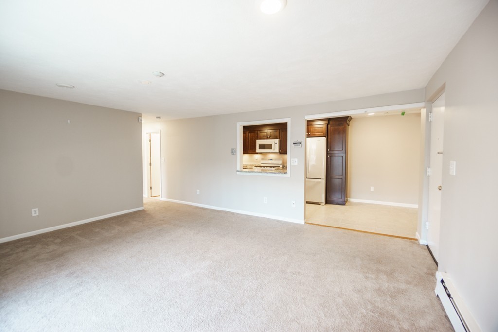 50 Colonial Drive, Unit 8 Andover, MA 01810 - Photo 9 of 25 a view of an empty room with a window