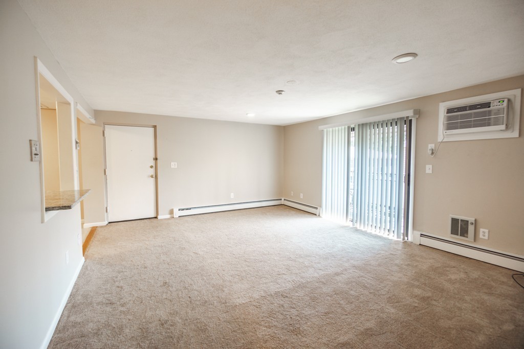 50 Colonial Drive, Unit 8 Andover, MA 01810 - Photo 10 of 25 a view of an empty room with a window