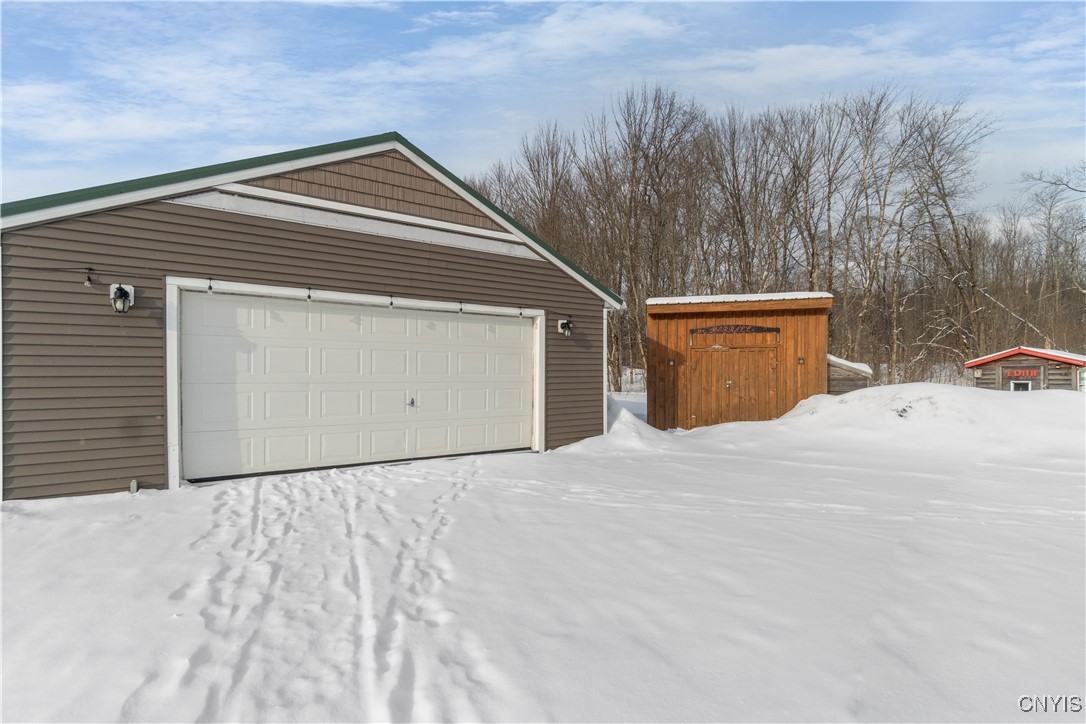 88 Case Road Williamstown, NY 13493 - Photo 22 of 28 The 2 car detached garage with electrical service!
