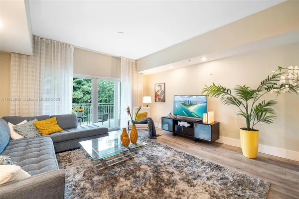 a living room with furniture and a couch