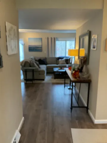 a living room with furniture and a table