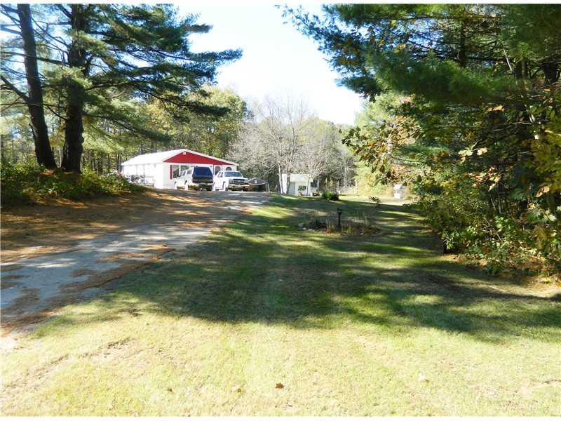 27 River Road Leeds, ME 04263 - Photo 3 of 24 Exterior Front. Private 2 acre lot ,...