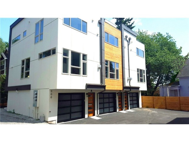 300 26th Avenue South, Unit B Seattle, WA 98144 - Photo 2 of 13 a black and white building with a outdoor space