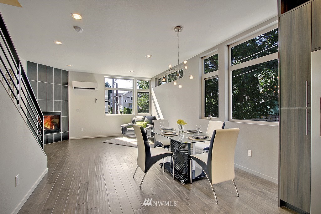 300 26th Avenue South, Unit B Seattle, WA 98144 - Photo 5 of 13 a dining room with furniture and window