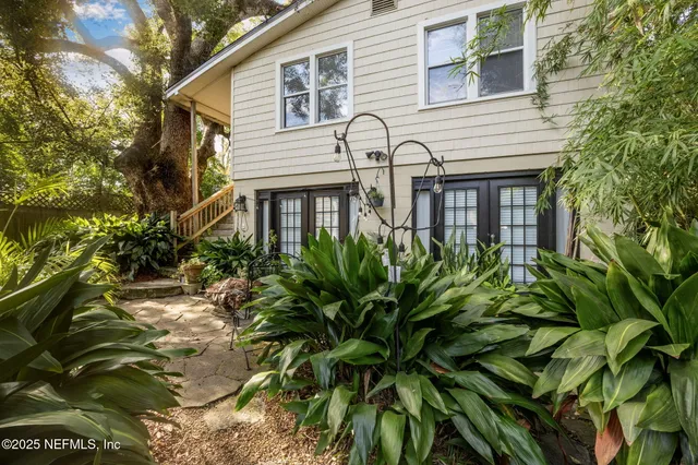 a view of a house with a plant