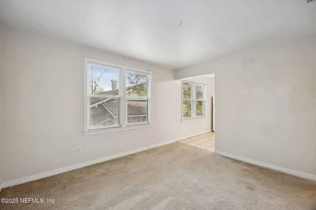 an empty room with windows