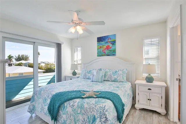 a bathroom with a granite countertop sink a mirror and a shower