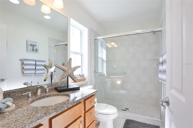 a view of a balcony with wooden fence