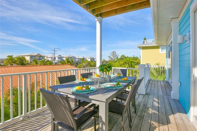a view of yard with swimming pool and sitting area