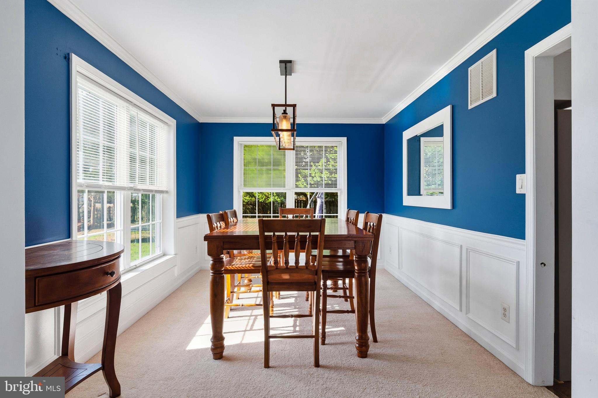 9 Penny Lane Perryville, MD 21903 - Photo 11 of 33 a view of a dining room with furniture window and wooden floor