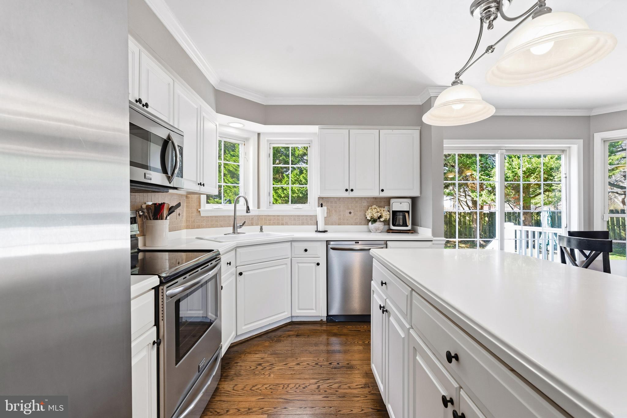 9 Penny Lane Perryville, MD 21903 - Photo 12 of 33 a kitchen with a sink stove and cabinets