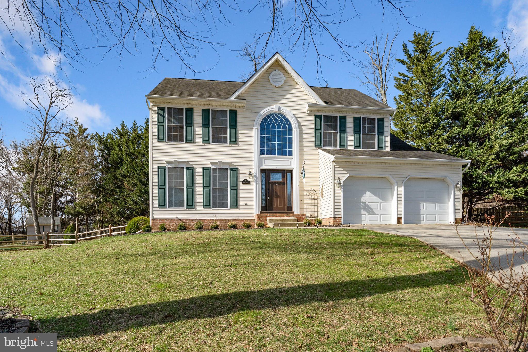 9 Penny Lane Perryville, MD 21903 - Photo 2 of 33 a front view of a house with a yard