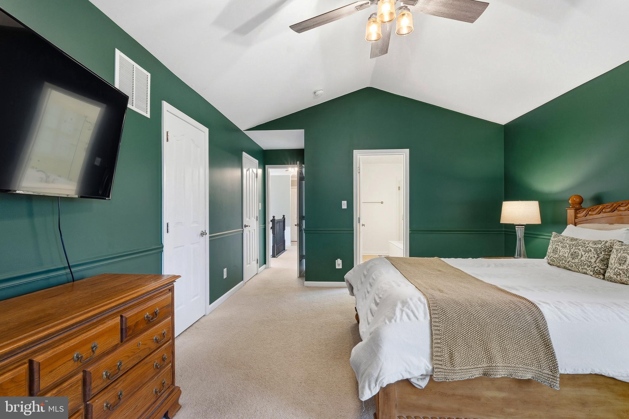 9 Penny Lane Perryville, MD 21903 - Photo 22 of 33 a bedroom with a bed and a flat screen tv
