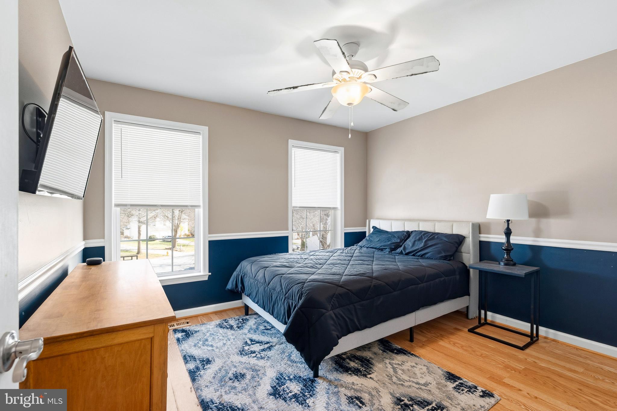 9 Penny Lane Perryville, MD 21903 - Photo 26 of 33 a bedroom with a bed and a chandelier