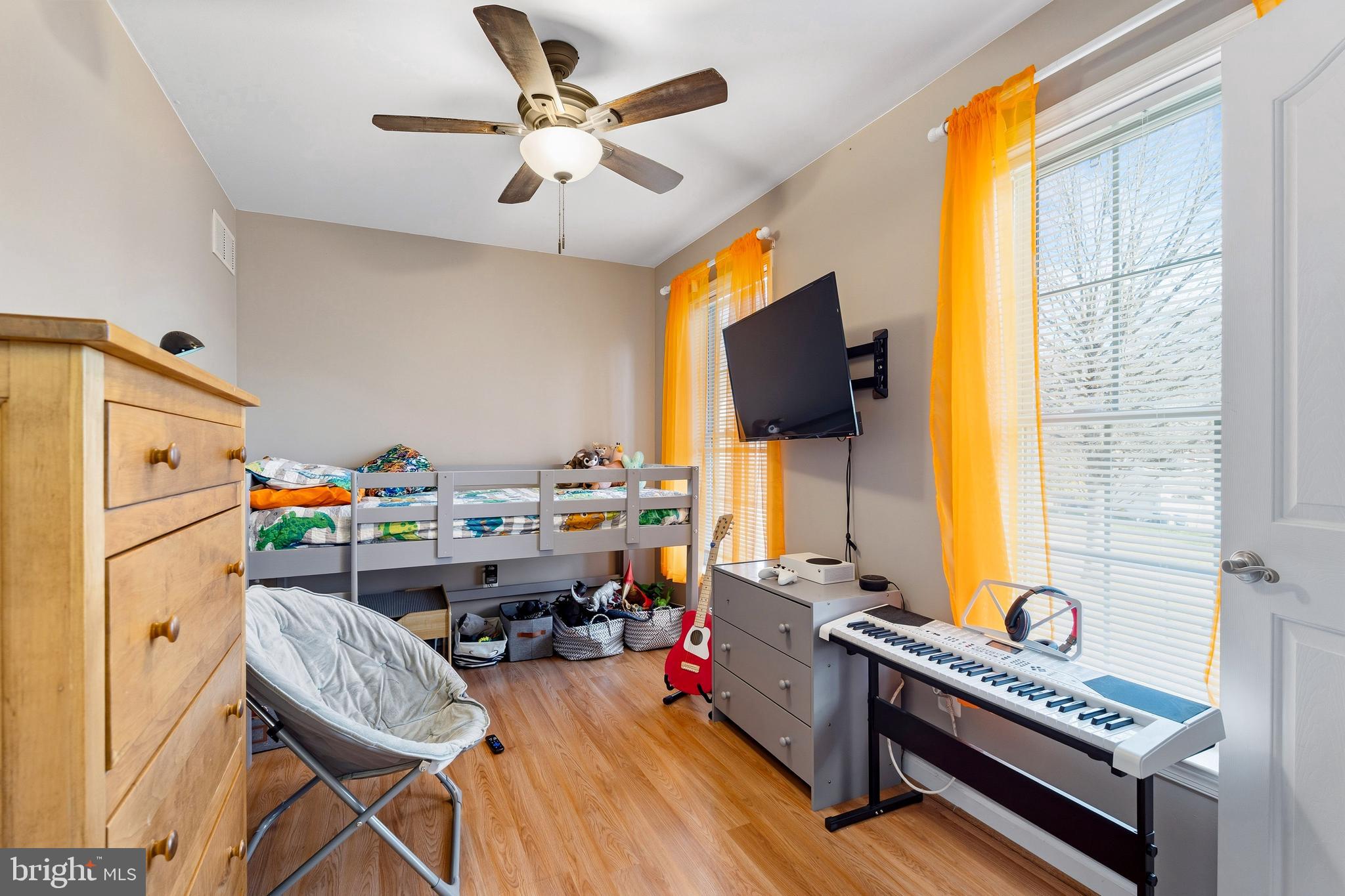 9 Penny Lane Perryville, MD 21903 - Photo 28 of 33 a living room with furniture and a flat screen tv