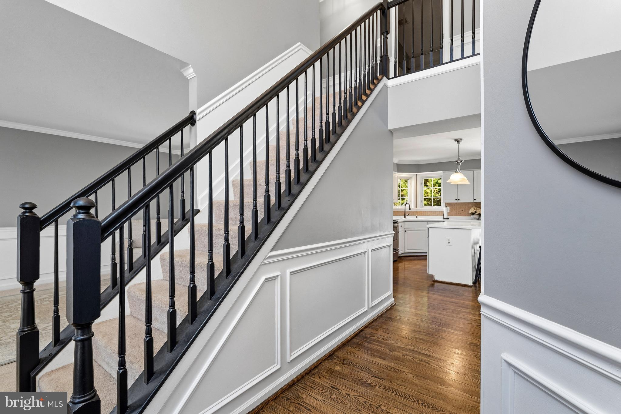 9 Penny Lane Perryville, MD 21903 - Photo 5 of 33 a view of an entryway with wooden floor and stairs
