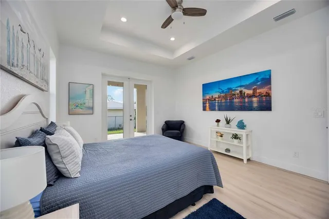 a front view of a house with a garden and yard