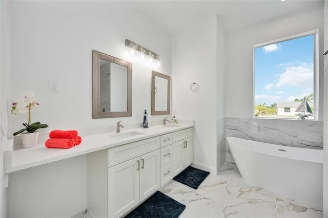 an aerial view of house with yard swimming pool and outdoor seating