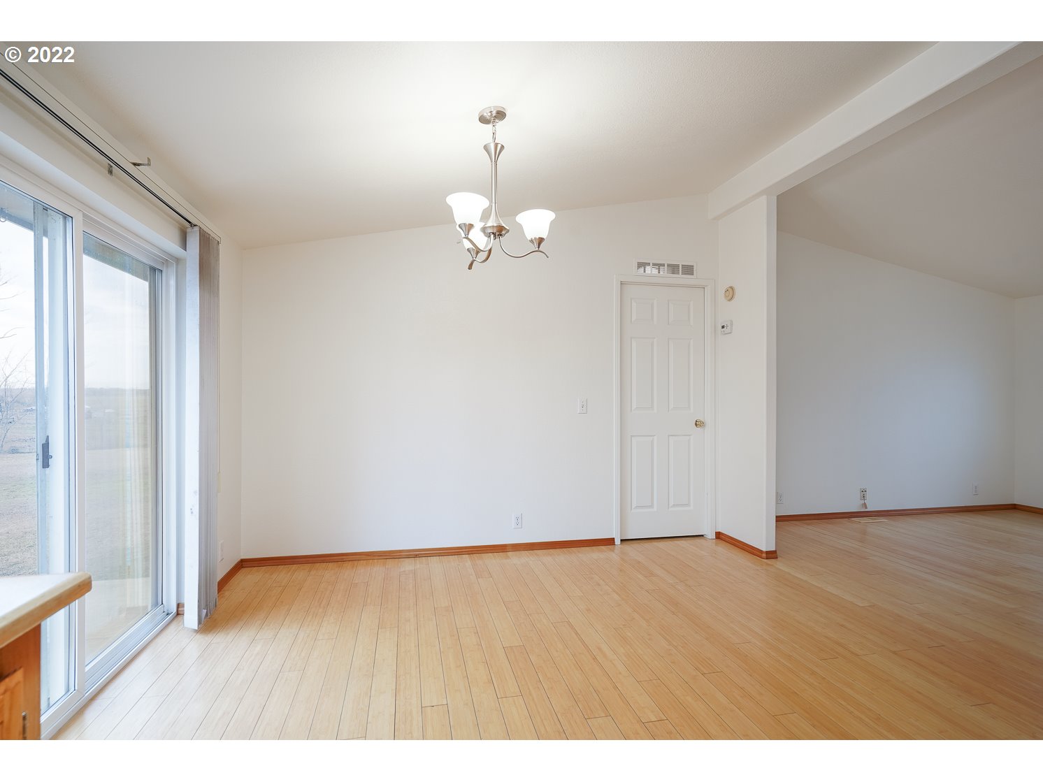 30668 Spring Court Hermiston, OR 97838 - Photo 12 of 23 a view of an empty room with wooden floor