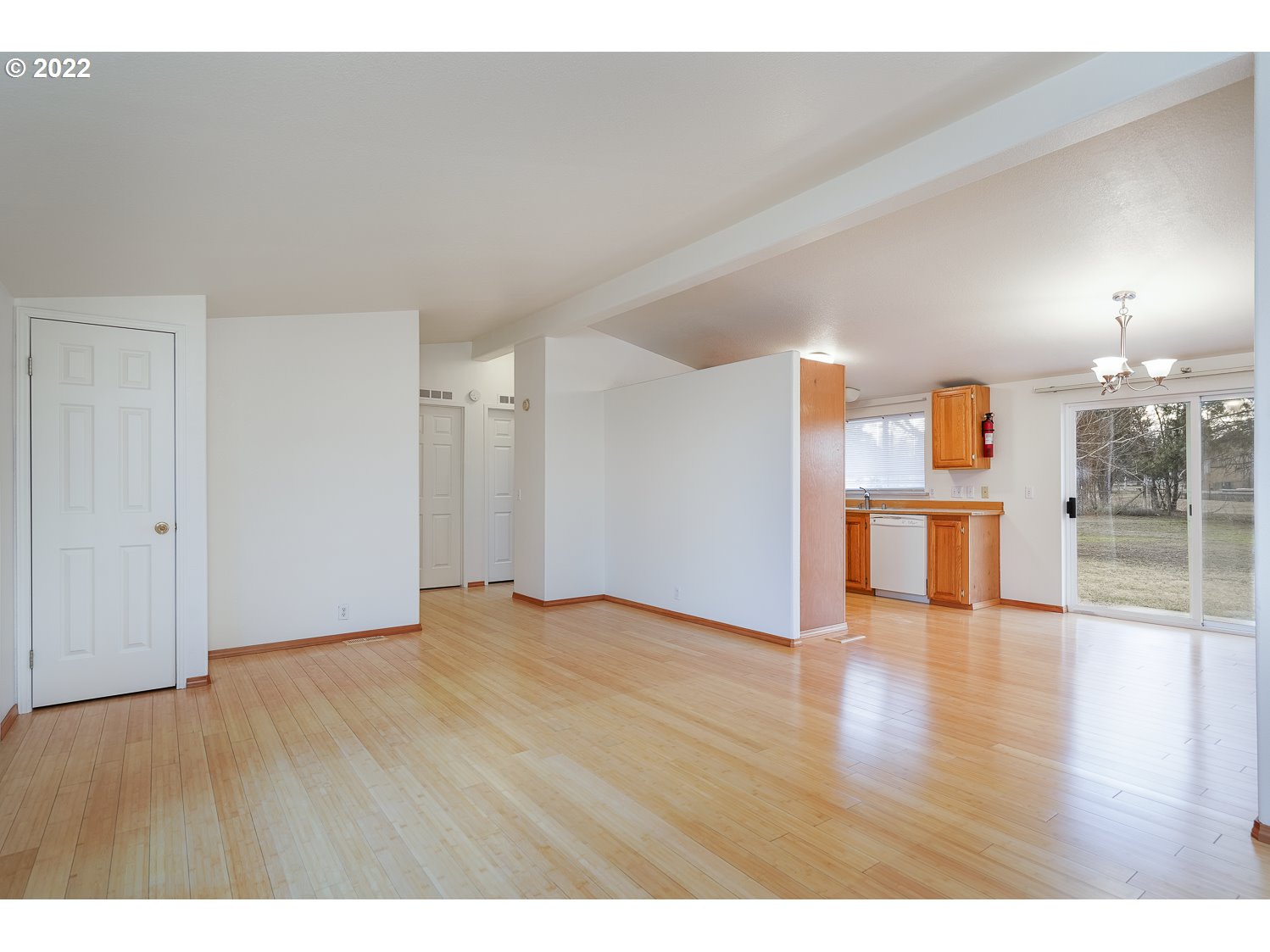 30668 Spring Court Hermiston, OR 97838 - Photo 9 of 23 a view of empty room with wooden floor