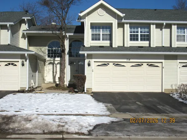 a view of a house with a garage