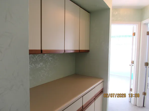 a room with storage and utility
