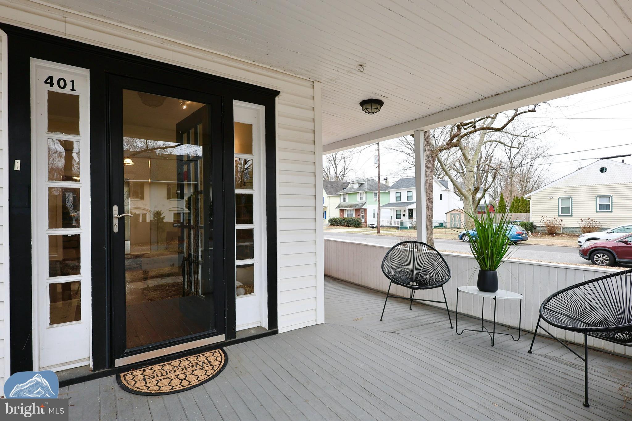 401 2nd Street Riverton, NJ 08077 - Photo 1 of 39 a living room with furniture a window and a glass door