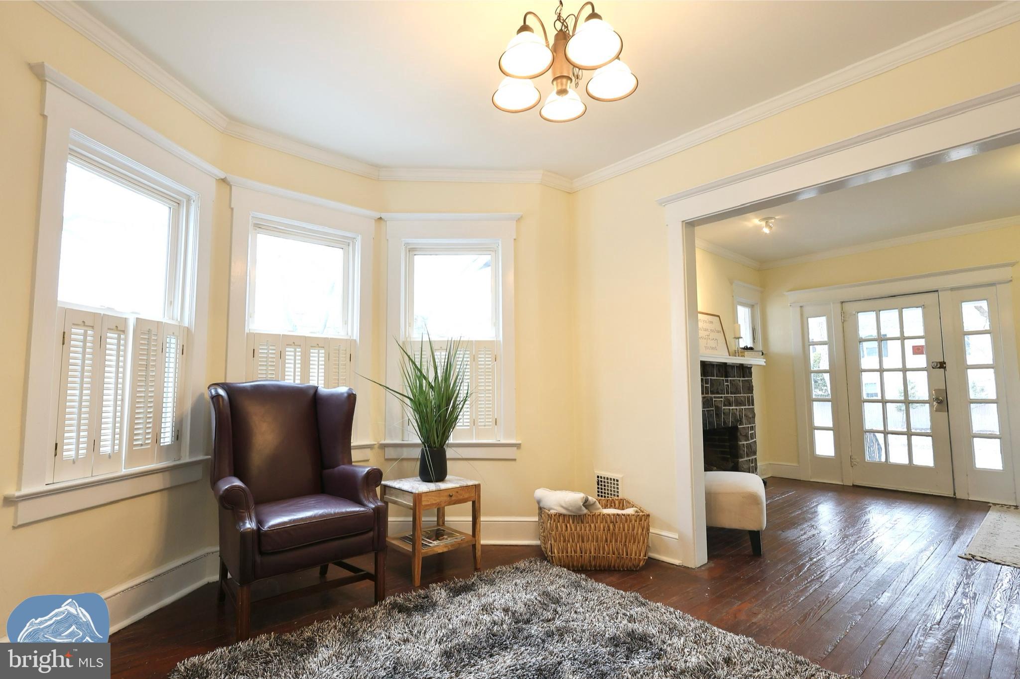 401 2nd Street Riverton, NJ 08077 - Photo 11 of 39 a living room with furniture and a large window